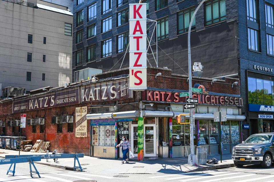 <p>While guests visit this East Village staple for their corned beef, Katz’s Delicatessen gained cult popularity from <em>When Harry Met Sally.</em> The deli in New York City even has a sign designating the exact seat where the scene between Meg Ryan and Billy Crystal was filmed.</p>