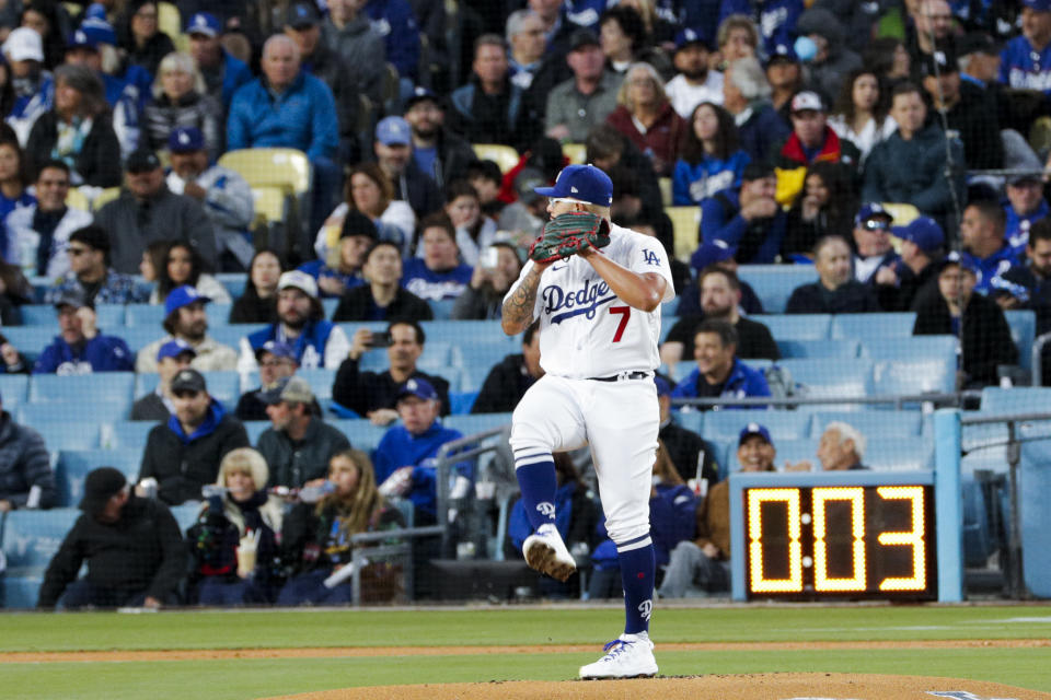 LOS ANGELES, CA - MARCH 30: Los Angeles Dodgers starting pitcher Julio Urias (7) delivers a pitch in front of the pitch clock during the first inning against the Arizona Diamondbacks at Dodger Stadium on Thursday, March 30, 2023 in Los Angeles, CA.(Gina Ferazzi / Los Angeles Times via Getty Images)