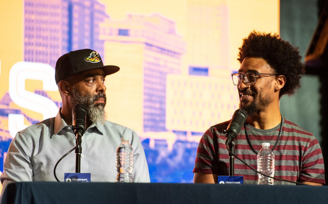 Roger Riddle, left, and Theron Brown, right, attending Ideastream's Sound of Ideas Community Tour: Reimagining Akron's Innerbelt as part of a panel, Tuesday, July 30, 2024, in Akron, Ohio.