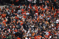 Baltimore Orioles fans cheer on the team during the first inning of a baseball game against the Los Angeles Angels, Thursday, March 28, 2024, in Baltimore. (AP Photo/Julia Nikhinson)