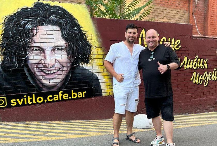 Vladyslav Lysenko (left) and his business partner and chef Ivan Kozyr stand outside their restaurant, Svitlo Café, in Dnipro, central Ukraine, in a photo shared by Lysenko on social media. / Credit: Vladyslav Lysenko/Instagram