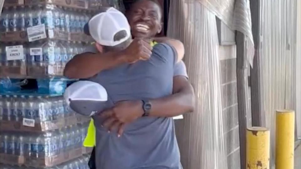 PHOTO: Bobo celebrated with his boss Frank Fumich after learning he was granted asylum by U.S. Citizenship and Immigration Services. (Frank Fumich via Storyful)