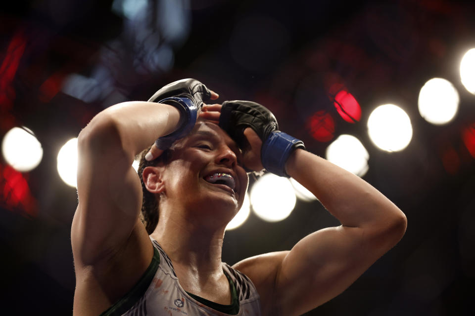 LAS VEGAS, NEVADA – MARCH 04: Alexa Grasso of <a class="link " href="https://sports.yahoo.com/soccer/teams/mexico/" data-i13n="sec:content-canvas;subsec:anchor_text;elm:context_link" data-ylk="slk:Mexico;sec:content-canvas;subsec:anchor_text;elm:context_link;itc:0">Mexico</a> reacts to her win over Valentina Shevchenko of Kyrgyzstan in the UFC flyweight championship fight during the UFC 285 event at T-Mobile Arena on March 04, 2023 in Las Vegas, Nevada. (Photo by Chris Graythen/Getty Images)
