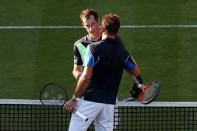 Tennis - WTA Premier & ATP 250 - Nature Valley International - Devonshire Park, Eastbourne, Britain - June 25, 2018 Britain's Andy Murray shakes hands with Switzerland's Stan Wawrinka after winning their first round match Action Images via Reuters/Paul Childs