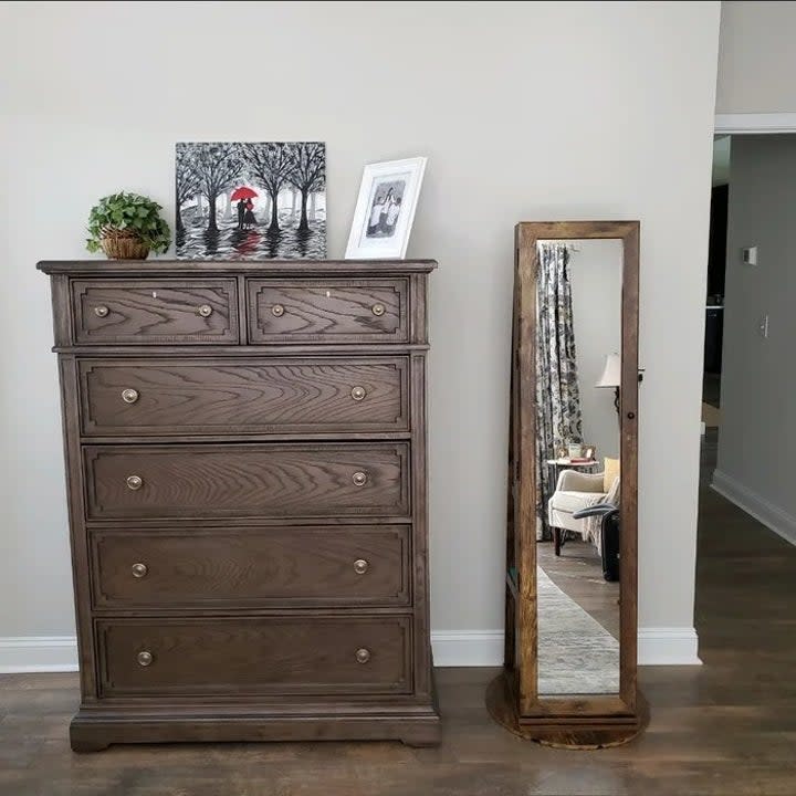 Reviewer's photo of the jewelry armoire in the color Rustic Brown, closed