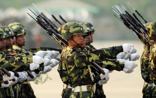 File photo shows Myanmar soldiers taking part in a military parade in Naypyidaw. Myanmar troops have committed serious rights abuses against civilians in an offensive against ethnic rebels that has forced tens of thousands to flee their homes, Human Rights Watch said Tuesday