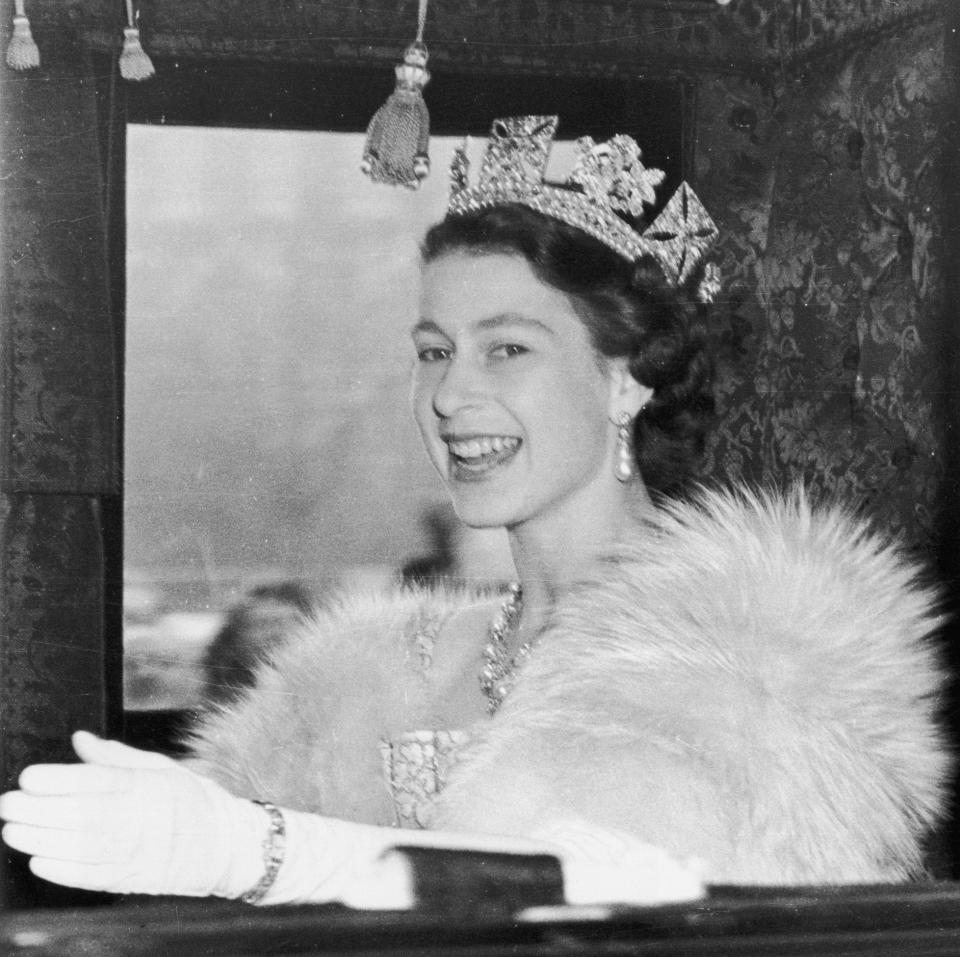 The Queen, pictured during her first State Opening of Parliament in 1952, has only missed the annual event twice during her long reign - Central Press/Getty Images