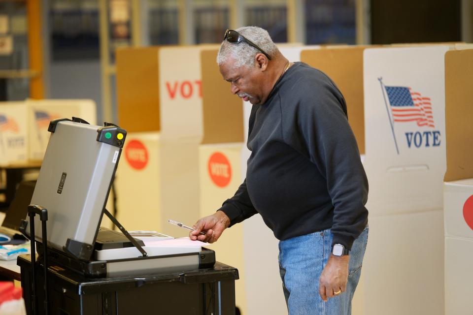 Matthew Carr votes on Super Tuesday at the Millwood Field House Tuesday, March 5, 2024.