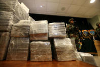 Peruvian police show to the press more than two tonnes of cocaine hidden in packages of asparagus destined for Amsterdam, and arrested a Serbian man and four Peruvians suspected of running a smuggling operation from a gourmet food business, authorities said, at police headquarters in Lima, Peru, January 12, 2017. REUTERS/Mariana Bazo