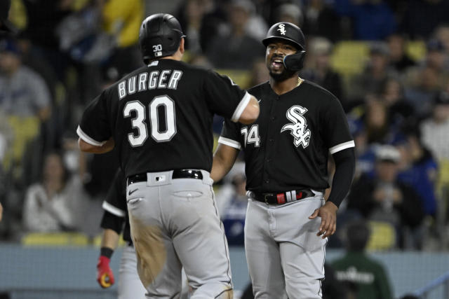 Chicago White Sox outfielder Clint Frazier can't make the catch on