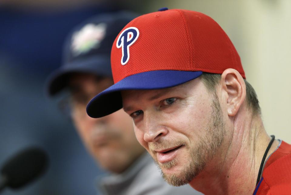 Philadelphia Phillies pitcher A.J. Burnett speaks during a news conference following a spring training baseball practice on Sunday, Feb. 16, 2014, in Clearwater, Fla. (AP Photo/Charlie Neibergall)