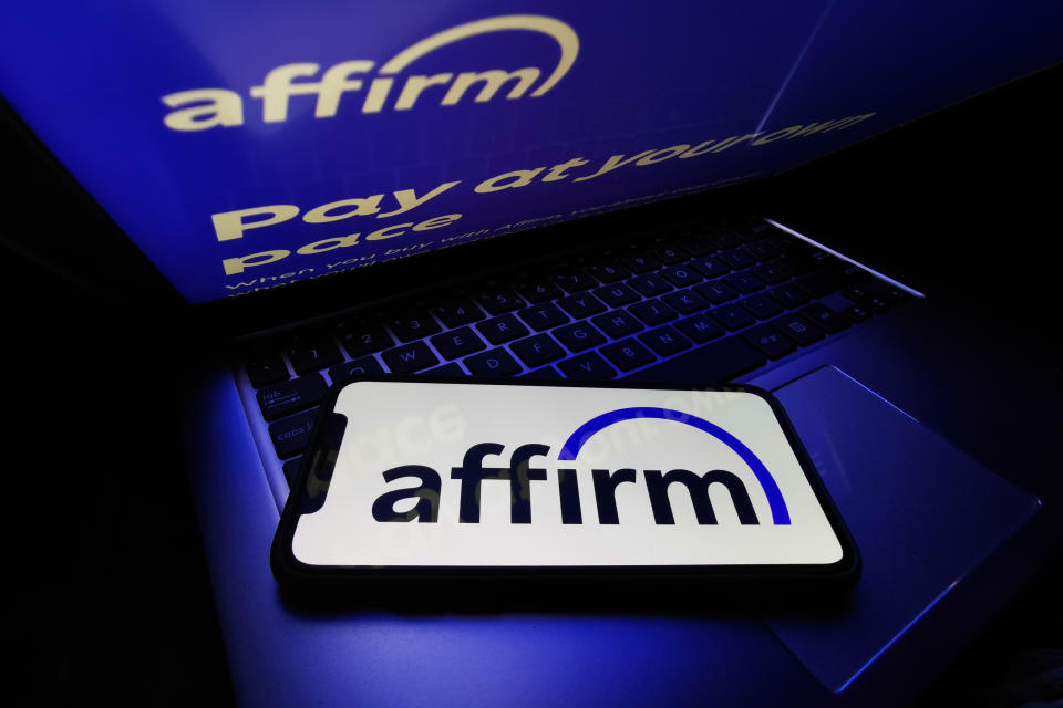 Affirm logo displayed on a phone screen and Affirm website displayed on a laptop screen are seen in this illustration photo taken in Krakow, Poland on August 16, 2021. (Photo by Jakub Porzycki/NurPhoto via Getty Images)