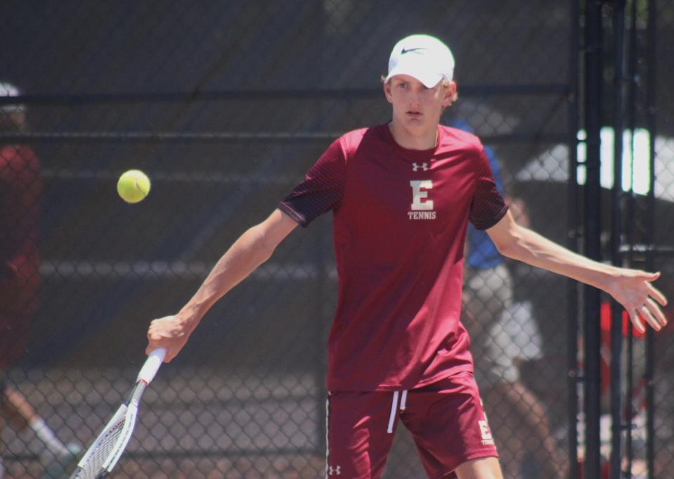 Owen Neal of Episcopal hits a shot against Mason Vogt of St. Johns Country Day during an FHSAA District 3-1A high school boys tennis match on Monday.