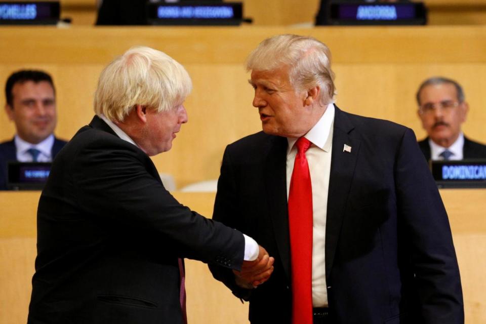 US President Donald Trump shakes hands with British Foreign Secretary Boris Johnson as they meet at the United Nations (REUTERS)
