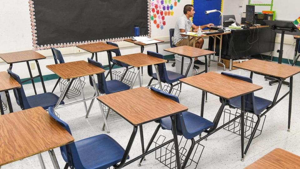 Empty desks in a California classroom.