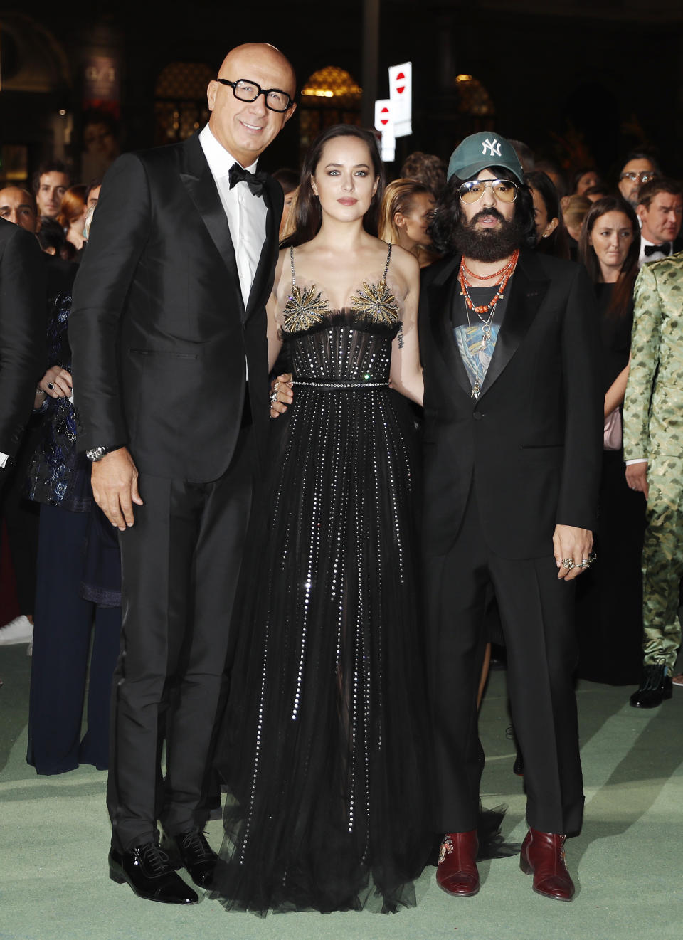 Dakota Johnson and Alessandro Michele at the Green Carpet Fashion Awards