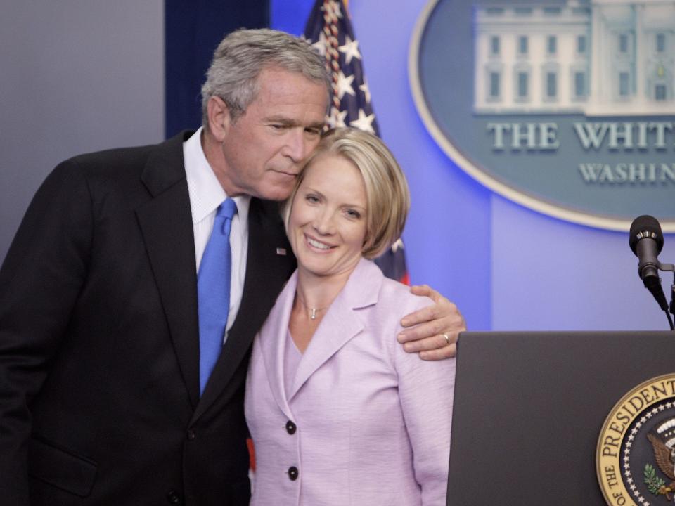 Bush hugs Perino in 2007.