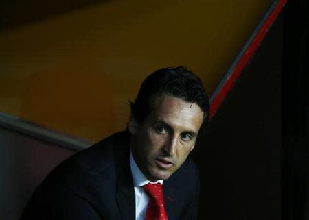 Sevilla's coach Unai Emery is seen before the start of their Europa League semi-final first leg soccer match against Valencia in Seville, April 24, 2014. REUTERS/Marcelo del Pozo