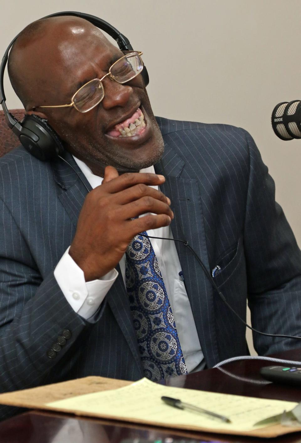 Jimmy Hall laughs while recording his interview with local members of the community during his “We Promote Community Success” podcast Tuesday morning, Feb. 28, 2023, at his studio in Shelby.