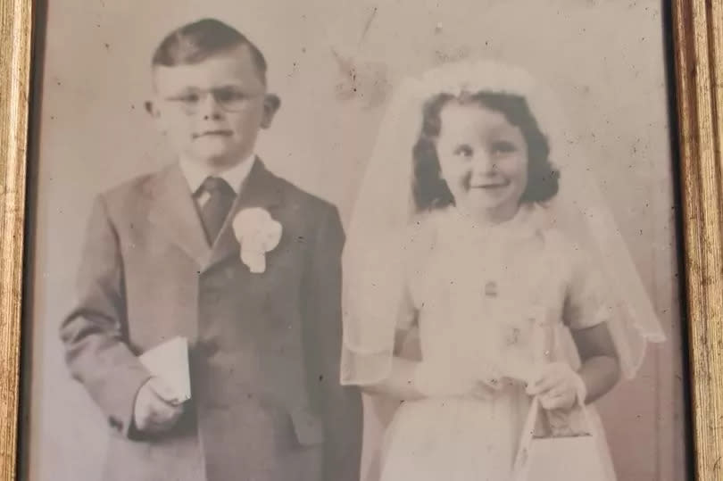 Pat Buckley pictured with his sister Mags on their first Holy Communion