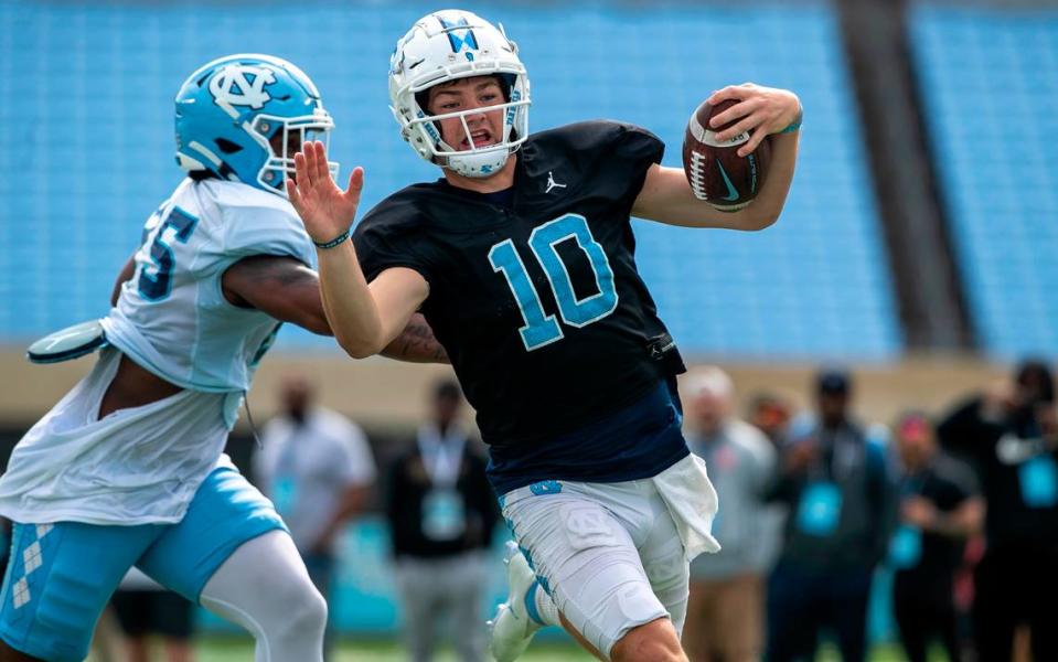 North Carolina quarterback Drake Maye (10) scores a touchdown on a short run during a scrimmage at the Tar Heels’ open practice on Saturday, March 25, 2023 at Kenan Stadium in Chapel Hill. N.C.