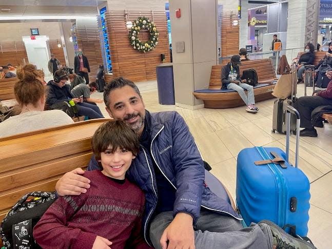 amanda adlers son and husband at new york train station