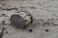 <p>A drum covered with ash lies outside a house affected by the eruption of the Fuego volcano at San Miguel Los Lotes in Escuintla, Guatemala, June 6, 2018. (Photo: Carlos Jasso/Reuters) </p>