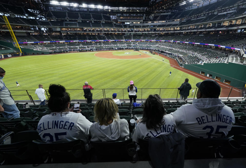 ARLINGTON, TX - OCTOBER 23: Fans watch batting practice before Game 3 of the 2020 World Series between the Los Angeles Dodgers and the Tampa Bay Rays at Globe Life Field on Friday, October 23, 2020 in Arlington, Texas. (Photo by Cooper Neill/MLB Photos via Getty Images)