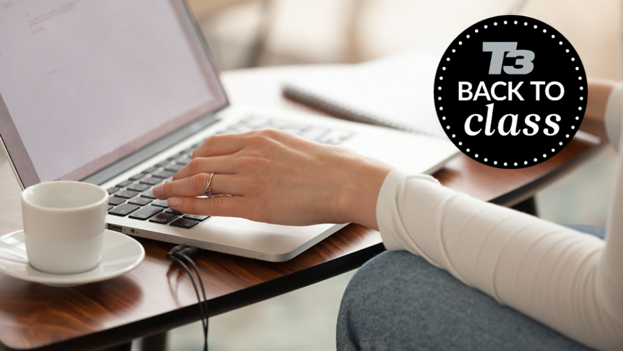  woman typing on laptop 