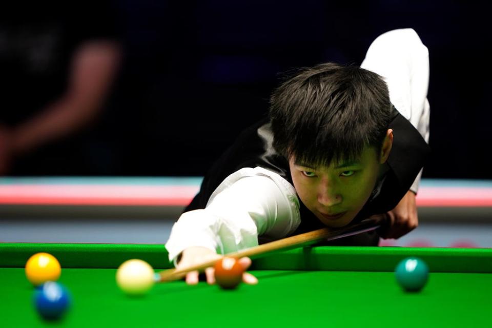 Zhao Xintong won the last three frames to beat John Higgins (Nigel French/PA) (PA Wire)