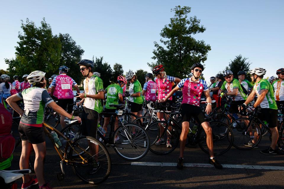 A group of riders wait for their 25-mile or 50-mile ride to start near McFerson Commons during Pelotonia in 2015.