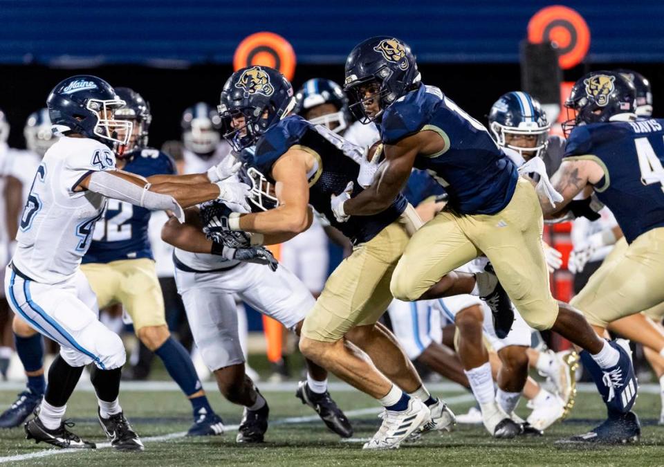 FIU Panthers wide receiver Jalen Bracey (14) runs with the ball against the Maine Black Bears in the second quarter of their NCAA DI football game at the FIU Football Stadium on Saturday, Sept. 2, 2023, in Miami, Fla.