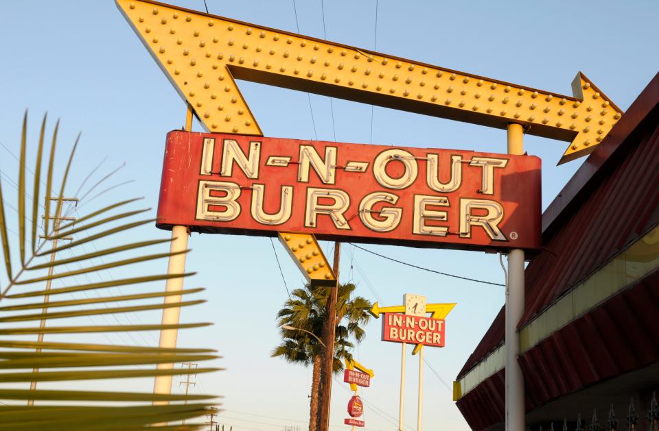 In-N-Out Burger signs fill the skyline on Tuesday, June 8, 2010, in Calif. The In-N-Out hamburger chain is sizzling mad after San Francisco shut down its indoor dining for refusing to check customers' vaccination status. The company's Fisherman's Wharf location, its only one in San Francisco. was temporarily shut by the Department of Public Health on Oct. 14.