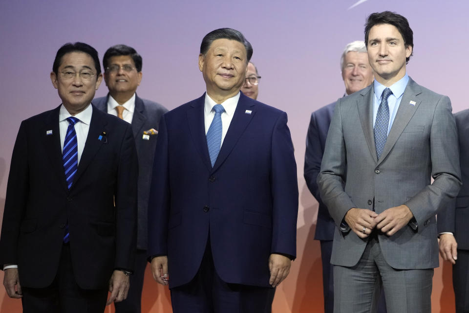 Japan's Prime Minister Fumio Kishida, Chinese President Xi Jinping and Canada's Prime Minister Justin Trudeau poses for a family photo at the annual Asia-Pacific Economic Cooperation summit, Thursday, Nov. 16, 2023, in San Francisco. (AP Photo/Godofredo A. Vásquez)