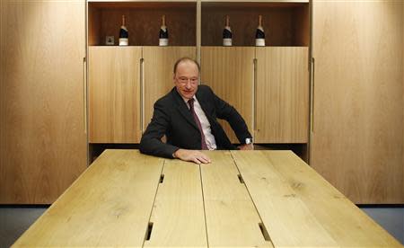 Julian Kirk, head of sales for West Sussex winemaker Nyetimber, one of Britain's sparkling wine producers, poses for a photograph in central London December 23, 2013. REUTERS/Olivia Harris
