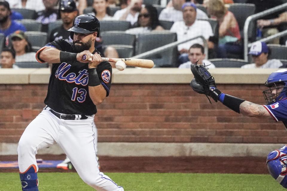 New York Mets' Luis Guillorme grounds into a double play during the second inning of the team's baseball game against the Texas Rangers, Friday, July 1, 2022, in New York. (AP Photo/Bebeto Matthews)