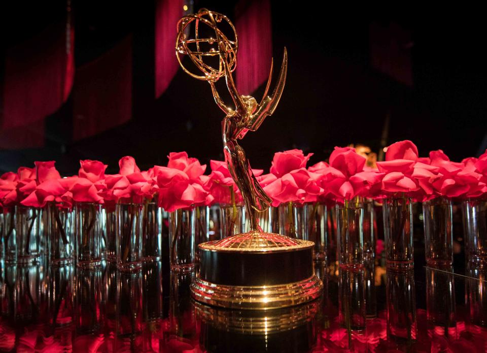 <p>MARK RALSTON/AFP via Getty</p> Emmy statue at the 71st Emmy Awards