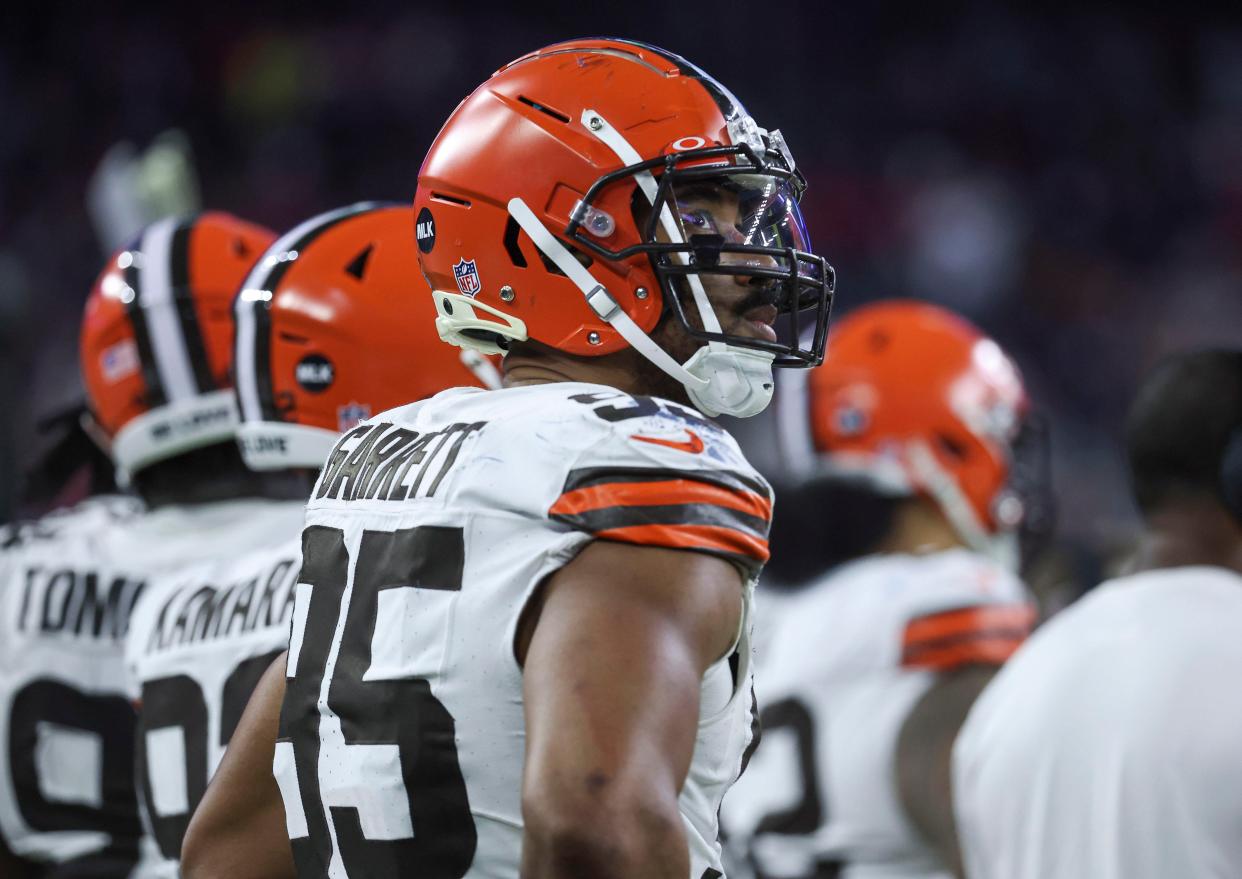 Browns defensive end Myles Garrett (95) looks up on the sideline in an AFC wild card game at the Houston Texans, Jan. 13, 2024.