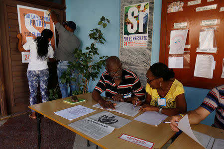 Officials prepare a polling station for the constitutional referendum in Havana, Cuba, February 17, 2019. Picture taken on February 17, 2019. REUTERS/Stringer