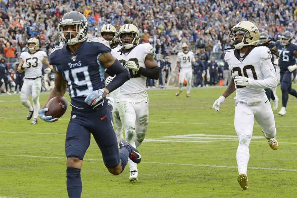 Tennessee Titans wide receiver Tajae Sharpe (19) scores a touchdown on a 36-yard pass reception against the New Orleans Saints in the second half of an NFL football game Sunday, Dec. 22, 2019, in Nashville, Tenn. (AP Photo/Mark Zaleski)