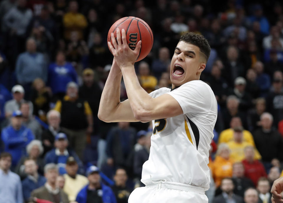 FILE – In this March 8, 2018, file photo, Missouri’s Michael Porter Jr. pulls down a rebound during the second half in an NCAA college basketball game against Georgia at the Southeastern Conference tournament, in St. Louis. The Missouri Tigers could be a very dangerous No. 8 seed in the West Region. How dangerous all depends on how quickly freshman Michael Porter Jr. can shake off the rust of missing all but 25 minutes of game time because of an injured back. (AP Photo/Jeff Roberson, File)