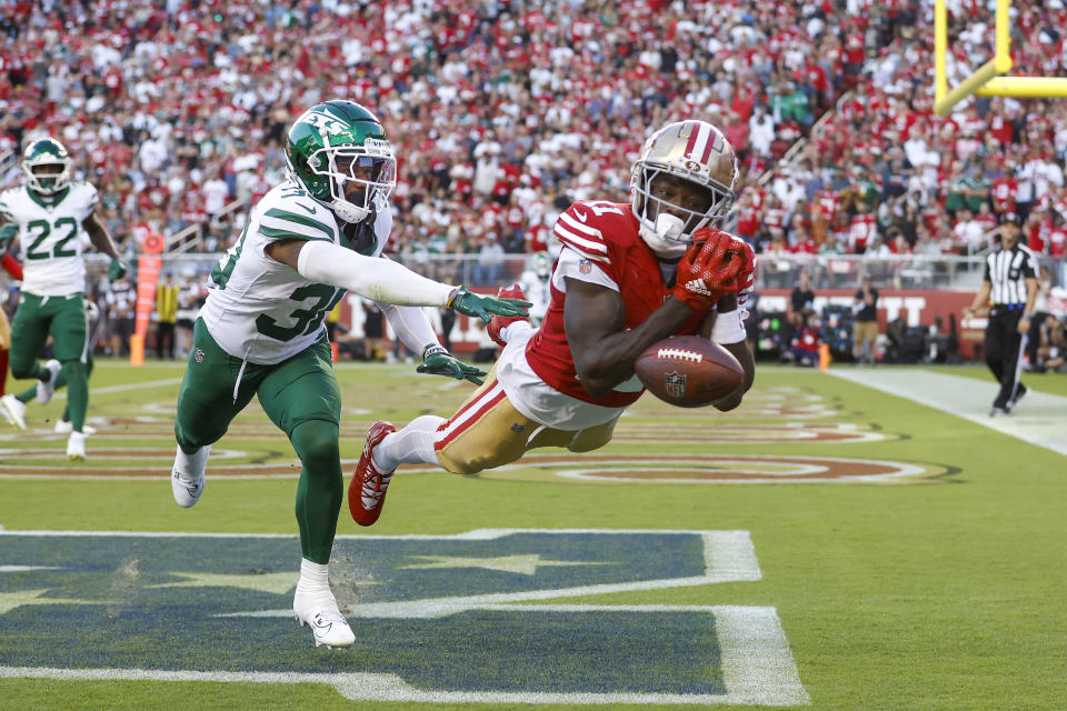 SANTA CLARA, CALIFORNIA – SEPTEMBER 9: Wide receiver Brandon Aiyuk #11 of the San Francisco 49ers drops a catch in the end zone against cornerback Michael Carter II #30 of the New York Jets during the second quarter at Levi's Stadium on September 9, 2024 in Santa Clara, California. (Photo by Lachlan Cunningham/Getty Images)