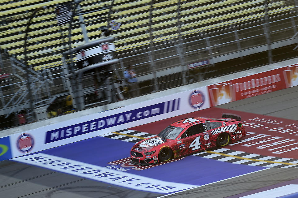 BROOKLYN, MICHIGAN - AUGUST 08: Kevin Harvick, driver of the #4 Busch Light Apple Ford, crosses the finish line to win the NASCAR Cup Series FireKeepers Casino 400 at Michigan at Michigan International Speedway on August 08, 2020 in Brooklyn, Michigan. (Photo by Jared C. Tilton/Getty Images)