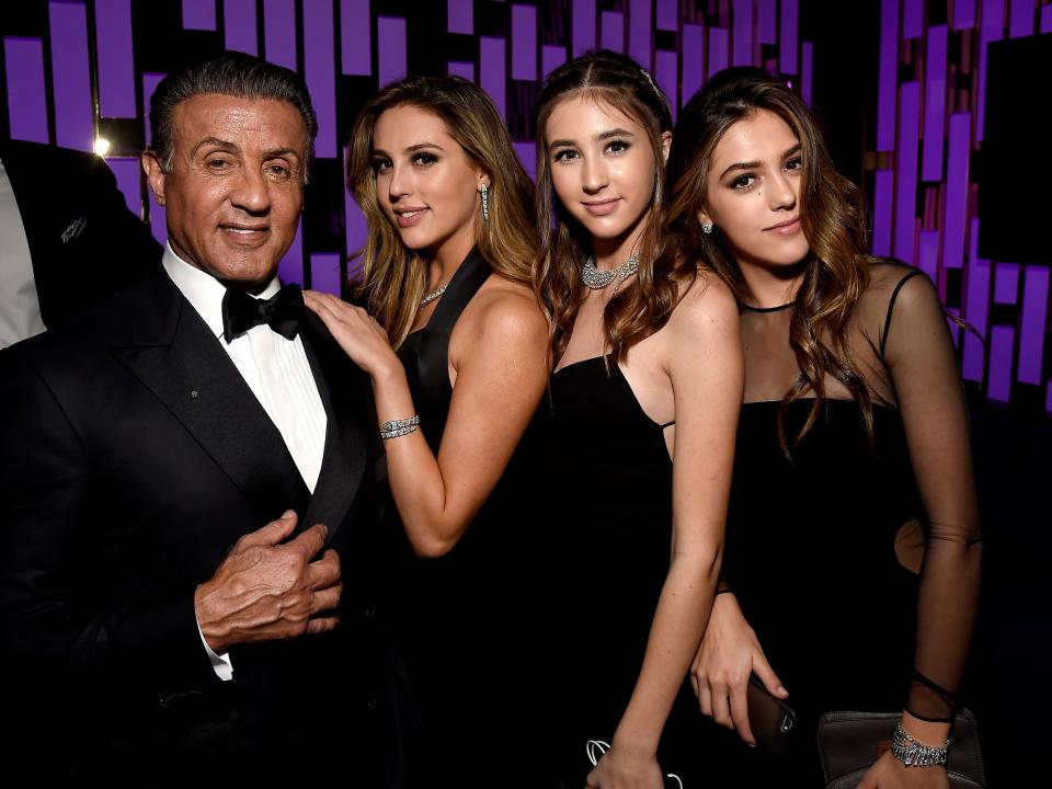 Stallone and his daughters.