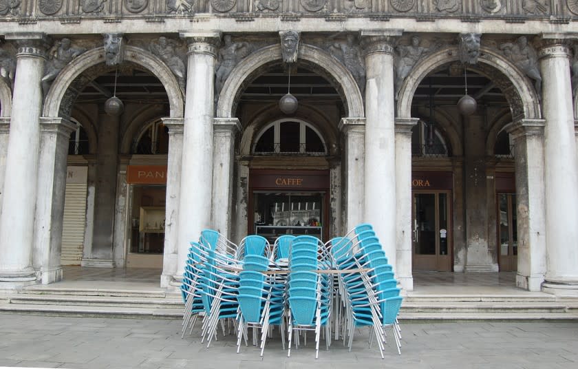 Cafes in Venice's Piazza San Marco remained closed on Monday even though they were allowed to reopen following the easing of coronavirus restrictions.