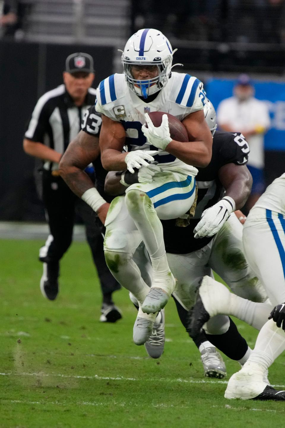 Indianapolis Colts running back Jonathan Taylor (28) runs the ball against the Las Vegas Raiders during the first half of an NFL football game, Sunday, Nov 13, 2022, in Las Vegas.