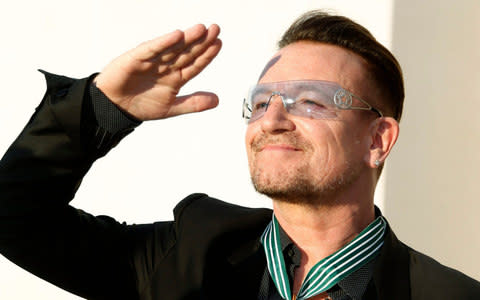 Bono after being awarded the honour of Commander in the Order of Arts and Letters in Paris in 2013 - Credit: Reuters/Reuters