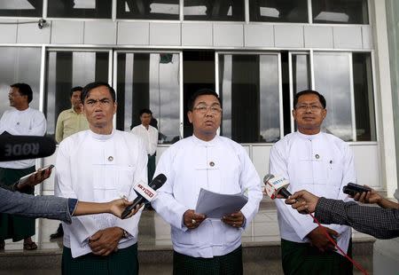 Than Tun (L to R), Pike Htwe and Maung Maung Htay spokepersons for the Union Solidarity and Development Party talks to the media during a news conference in their party head office in Naypyitaw, August 13, 2015. REUTERS/Soe Zeya Tun