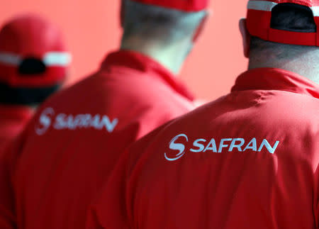 Employees of Safran attend the delivery of the first series-production LEAP-1A propulsion systems by Aircelle for the A320neo aircraft Airbus family at the Aircelle plant in Colomiers near Toulouse, Southwestern France, April 15, 2016. REUTERS/Regis Duvignau