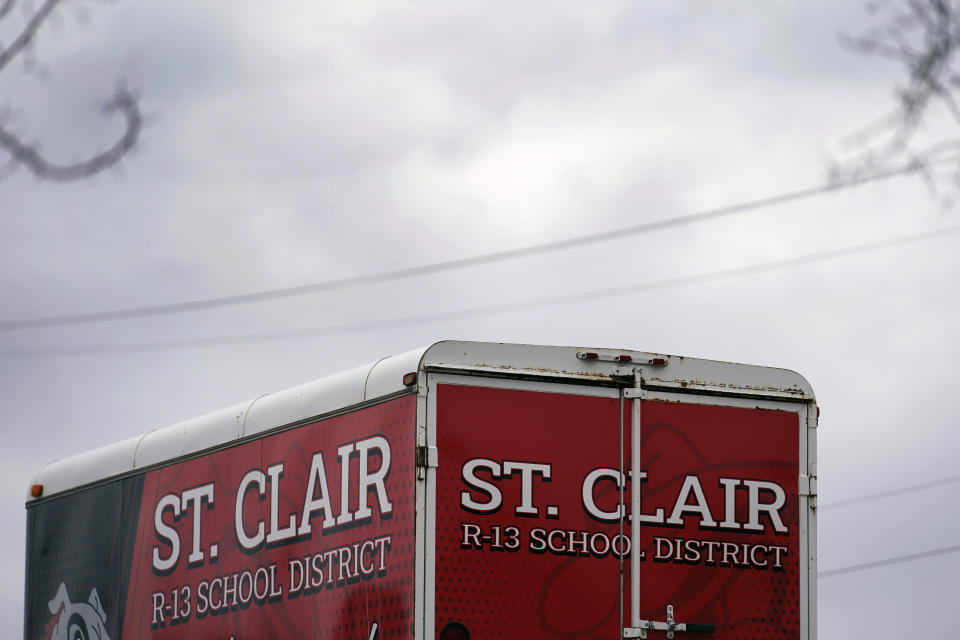 A trailer is seen parked outside St. Clair High School, Friday, Dec. 8, 2023, in St. Clair, Mo. Two teachers at the rural Missouri high school have resigned after it was discovered they were posting racy content on the subscription platform OnlyFans. (AP Photo/Jeff Roberson)